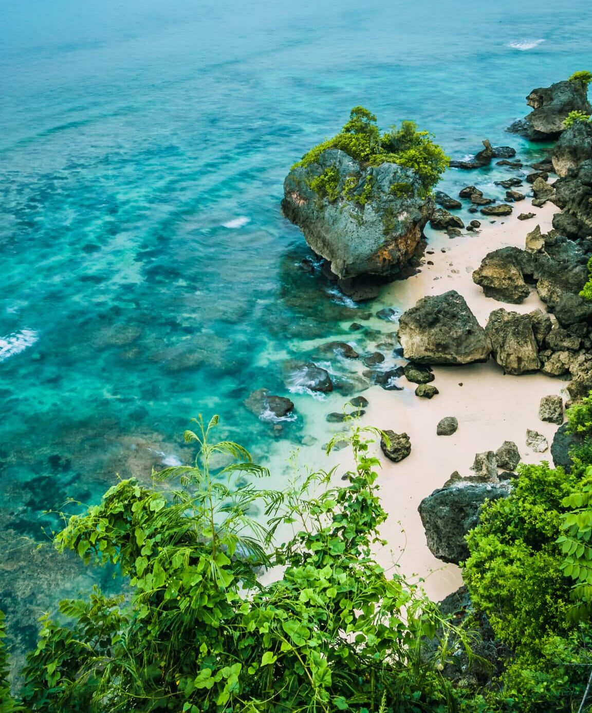 Rock on Impossible Beach in Evening Light, Bali Indonesia.