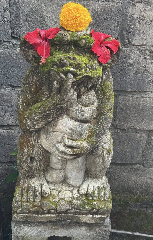 Statues and offerings at Swasti Eco Cottages