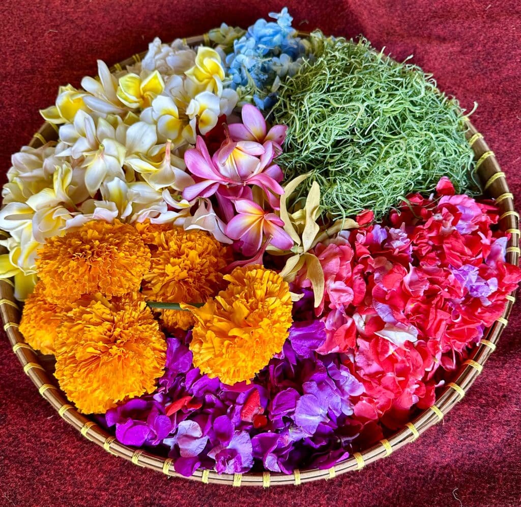 The making of offerings. Photo by Laura Davis.
