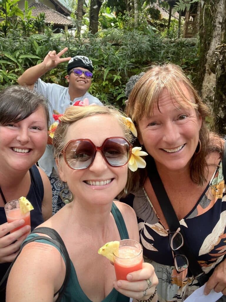 Happy travelers enjoying their welcome drink. Photo by Nancy Kramer.