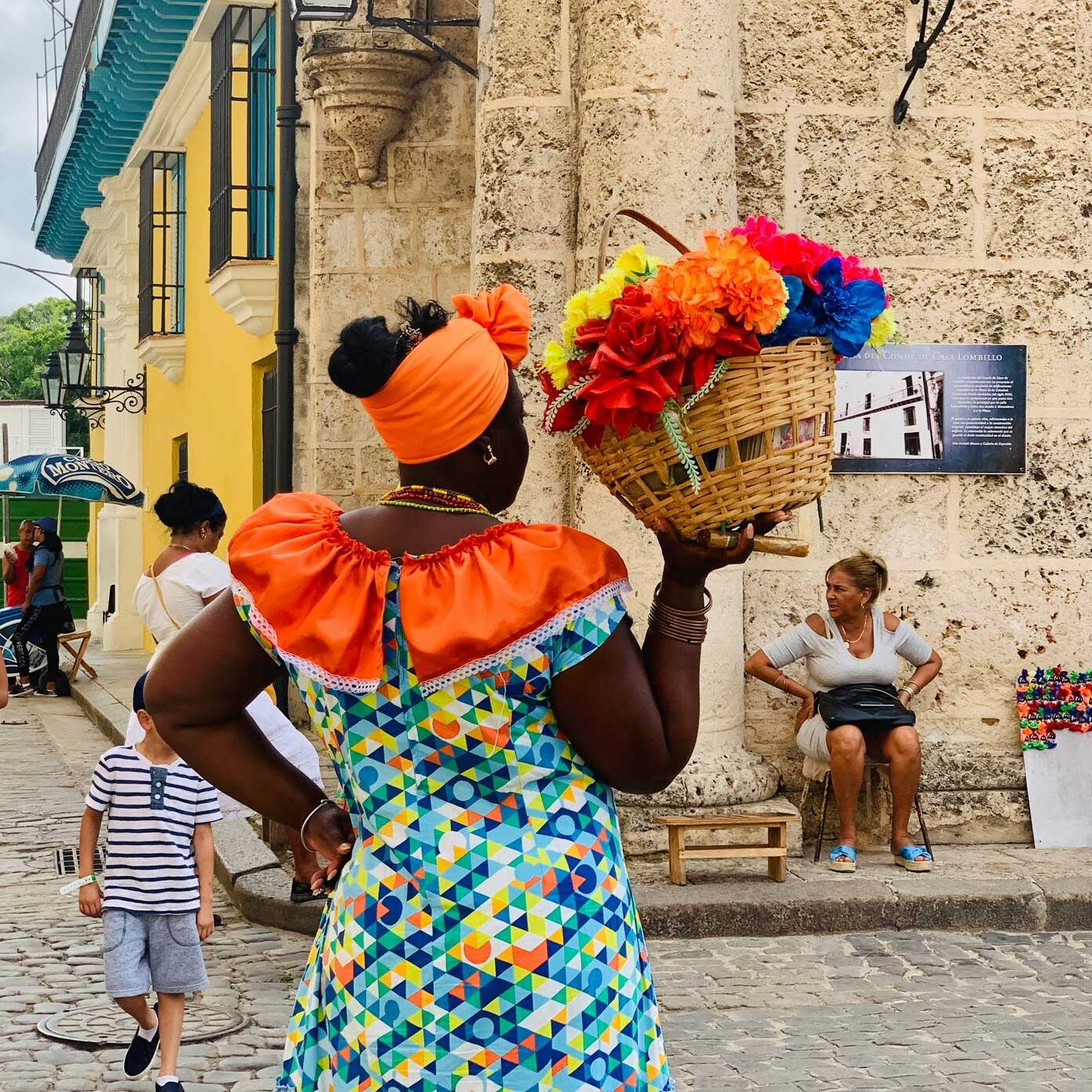 woman-in-Havana-plaza-photo-by-xh_s-on-unsplash_2000px